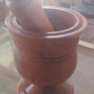 Brown wooden pestle and mortar set