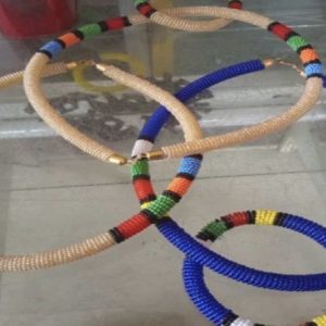 Variety of brown and black wooden bracelets