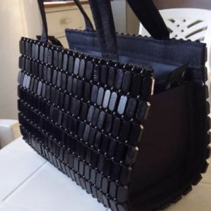 Black handle beaded handbag