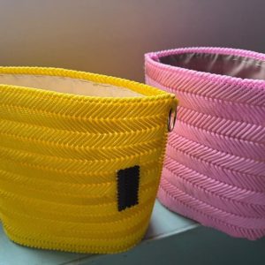 Pink and yellow woven baskets